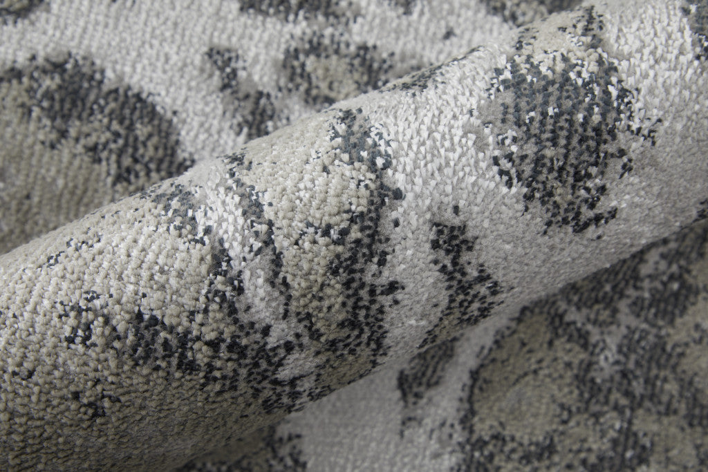 4' X 6' Gray and Ivory Abstract Power Loom Non Skid Area Rug